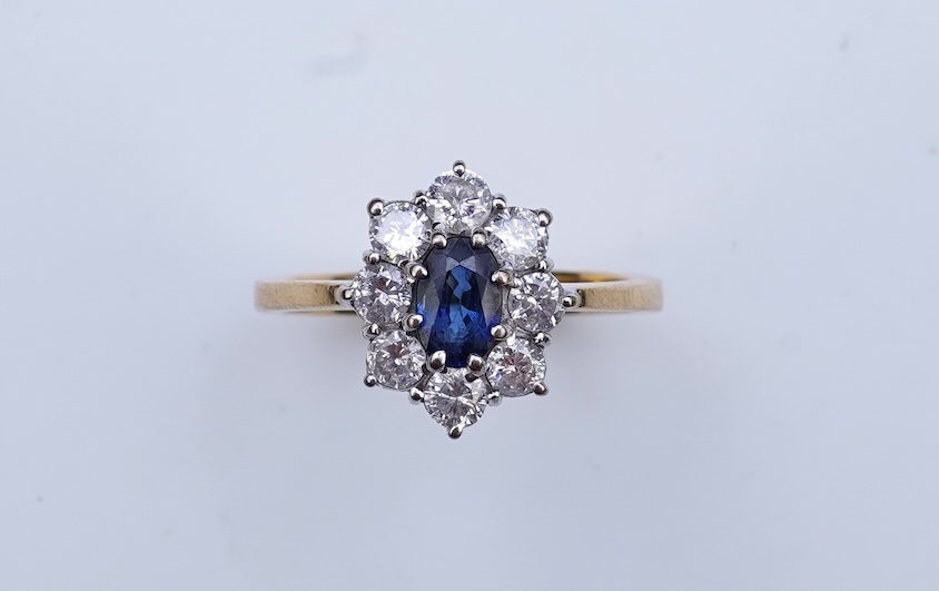 A sapphire and diamond cluster ring
